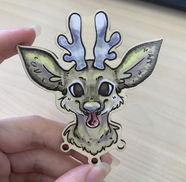Final reindeer pin before they got sent to me for backs and bells! (this picture makes them WAY more green than they are in person)