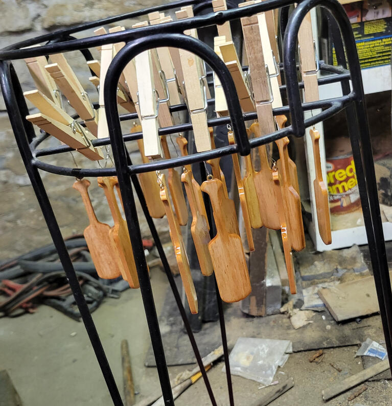 My cellar, home to my woodworking tools and the safest place to stain the paddles.